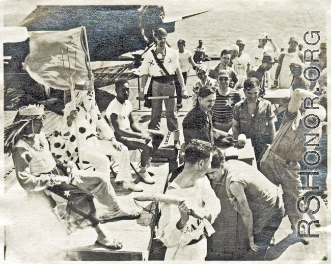 Allegretto, taken aboard MISSION BAY. He is over toward the left, standing behind the "pirate". MISSION BAY also carried fifty of the first P-47s to reach the theater.