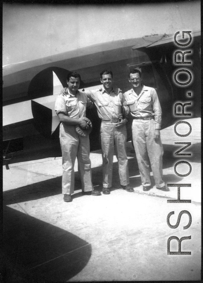 Captain Brignow, our Dentist. Mr. Clarkson, Red Cross Rep. Captain Wilson Porch.  Shamshernagar Air Base, India, June 1945.