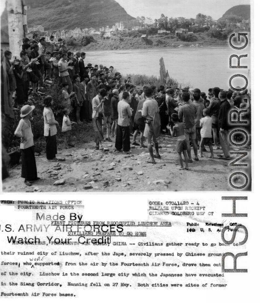 Excited civilians applaud and surround American GIs who have just returned to Liuzhou on the heels of the retreating Japanese upon the failure of the Ichigo Campaign.