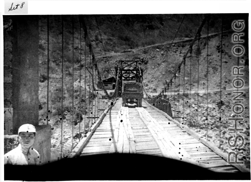 An American truck crosses the Salween River bridge during WWII.