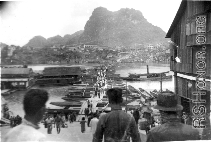 Looking over the river across the floating bridge towards Horse-saddle Mountain (马鞍山) in Liuzhou city, Guangxi province, during WWII.