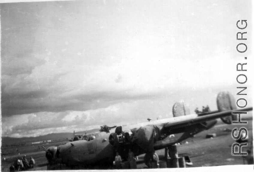 A B-24 under maintenance by 396th Air Service Squadron during WWII, in China. 