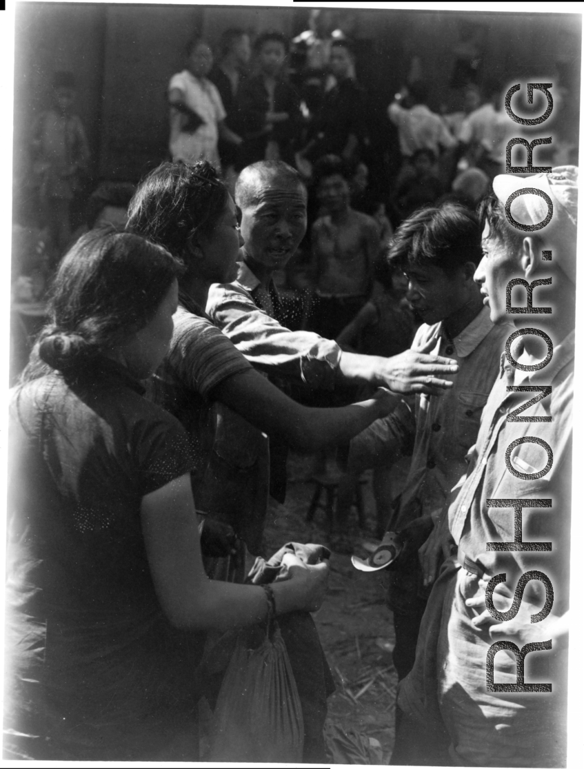 An argument among refugees the Liuzhou railway station in the fall of 1944.