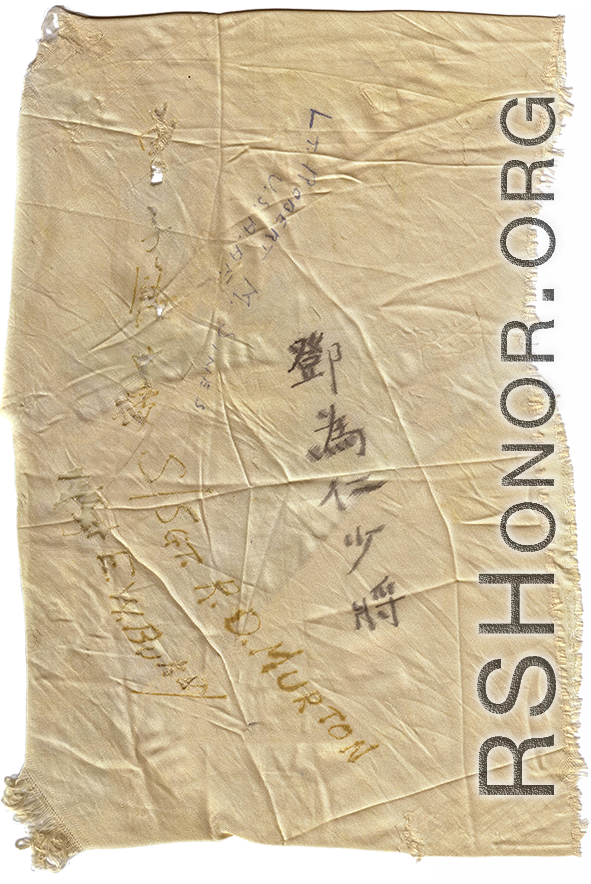 Keepsake--a piece of the parachute used to bailout, signed by all the people who bailed out that da