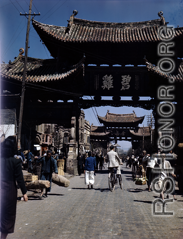 "Emerald Chicken" 碧鸡 and "Golden Horse" 金马 gates in Kunming during WWII, usually considered a pair: Golden Horse And Emerald Rooster Archway (金马碧鸡坊).  In the CBI during WWII.