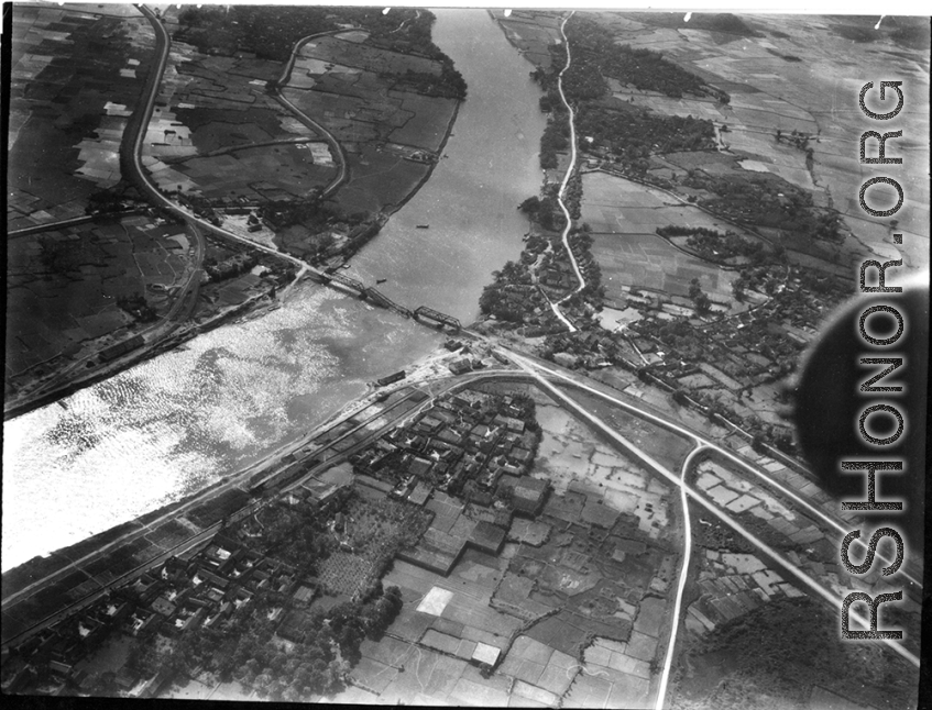 Bombing of Đò Lèn Bridge in Hà Trung Town in French Indochina (Vietnam), during WWII. In northern Vietnam, and along a critical rail route used by the Japanese.