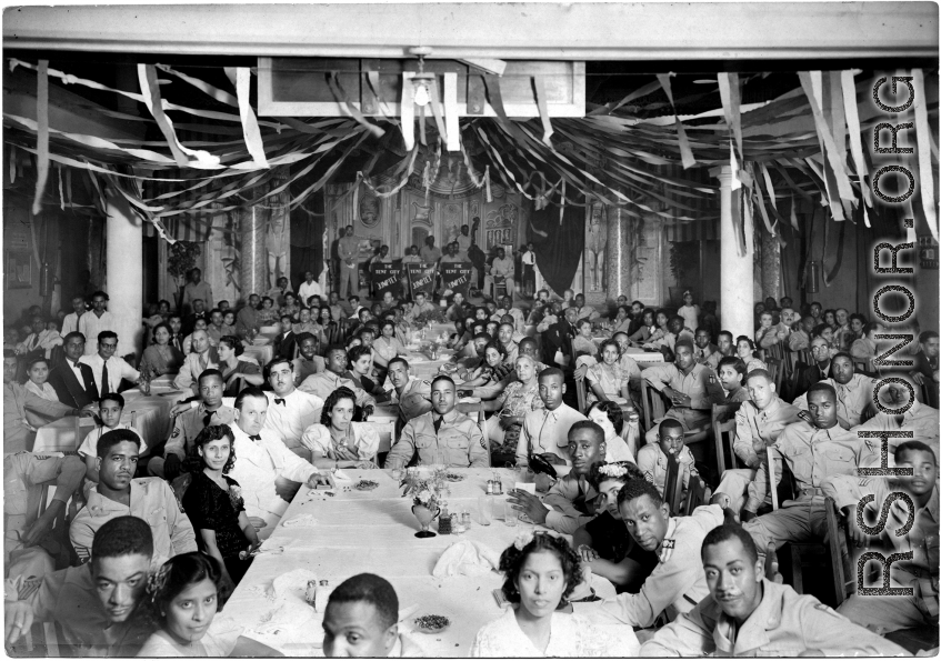 A fascinating and rare image of a party or similar celebration of mostly African American CBIers. 