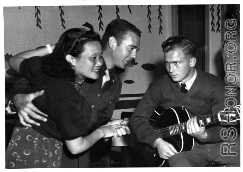 Alice Chong and Captain Addison Bailey dance while another GI plays guitar.  (Images and information primarily courtesy of Brian Dillon.)