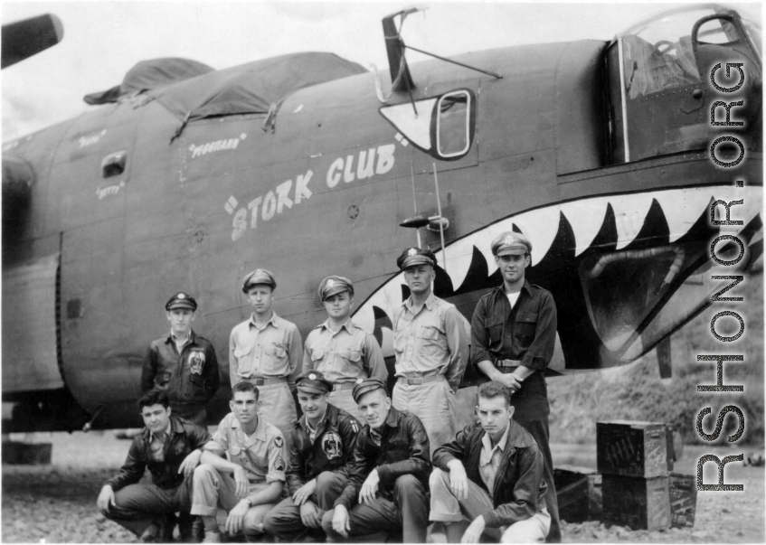 The B-24 bomber "Stork Club" crew posing for a picture.  Harry Nutter Russell is kneeling second from the left. He disappeared when he bailed out of "Stork Club," and presumably drowned in Lake Dian (Kunming Lake). (Thanks L. Silverman for the extra info!)