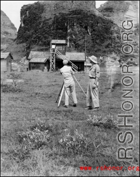 Cameramen film at an American air base in Guangxi province, China, during WWII. This is either Liuzhou base or Guilin base.
