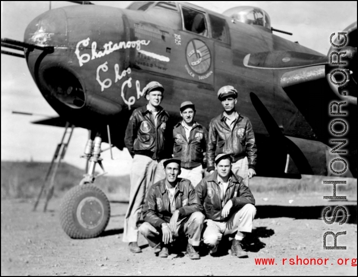 Unidentified aircrew members beside "Chattanooga Choo Choo", an 'experienced' B-25H, at Yangkai AB, China. This 491st Bomb Squadron aircraft carries the marking of many missions flown and two Japanese ships sunk. Possibly taken in the fall of 1944 or spring of '45.