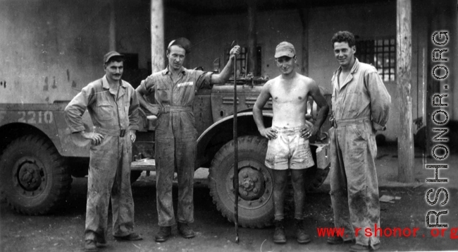 Nash (far left) and Nick Arico (third from left) and others, and the snake, at Luichow, Oct 1944.
