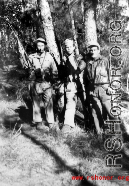 Intrepid GIs out exploring (or maybe even hunting) with their carbines among the pines near Yangkai. During WWII.
