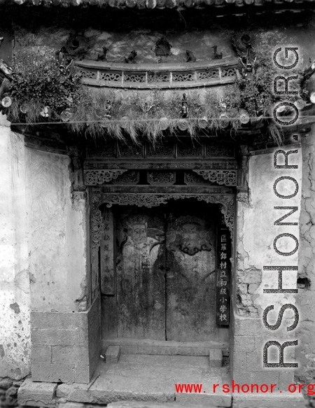 Architecture in Yunnan province, China, which turns out to be the gate to a elementary school in Luojin Village (罗锦村) in Songming county. During WWII.