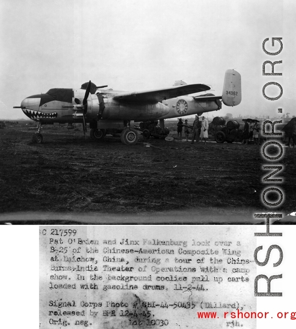 Pat O'Brien and Jinx Falkenburg look over a B-25 of the Chinese-American Composite Wing (CACW) at Liuzhou (Liuchow), China, during a tour of the China-Burma-India Theater (CBI) of Operations with a camp show. In the background coolies pull up carts loaded with gasoline drums. 11-2-1944