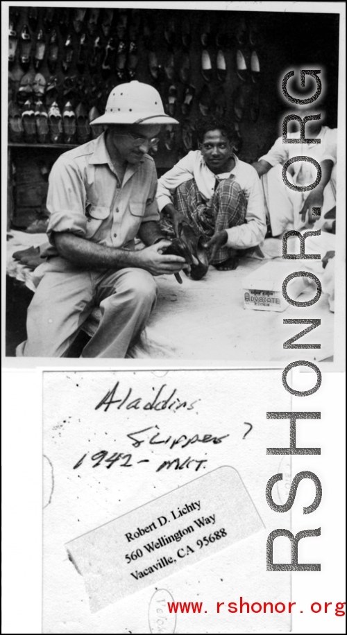 GI buying slippers in a shop in India, 1942.   Photo from Robert D. Lichty.