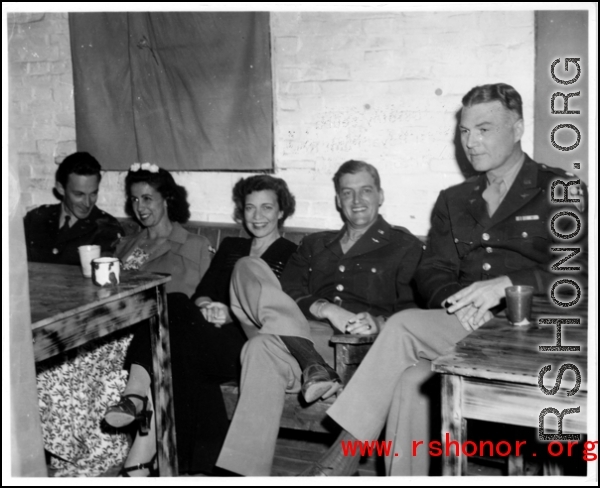 Officers and ladies relax in the CBI during WWII, during a party and dance at the Hostel #10 Officer's Club on January 19, 1945.