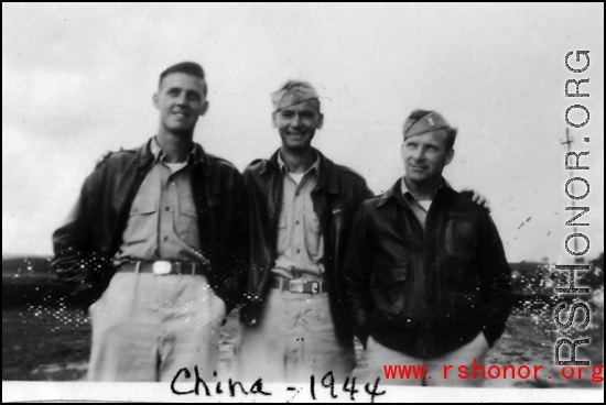 Flyers Folke Johnson, Edward Price, and Paul Hunt, members of the same B-24 bomber crew, pose together in China in 1944.