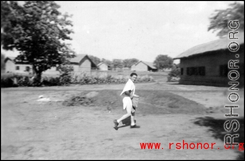 Nick Arico coming from shower, Chaukulia, India 1943.