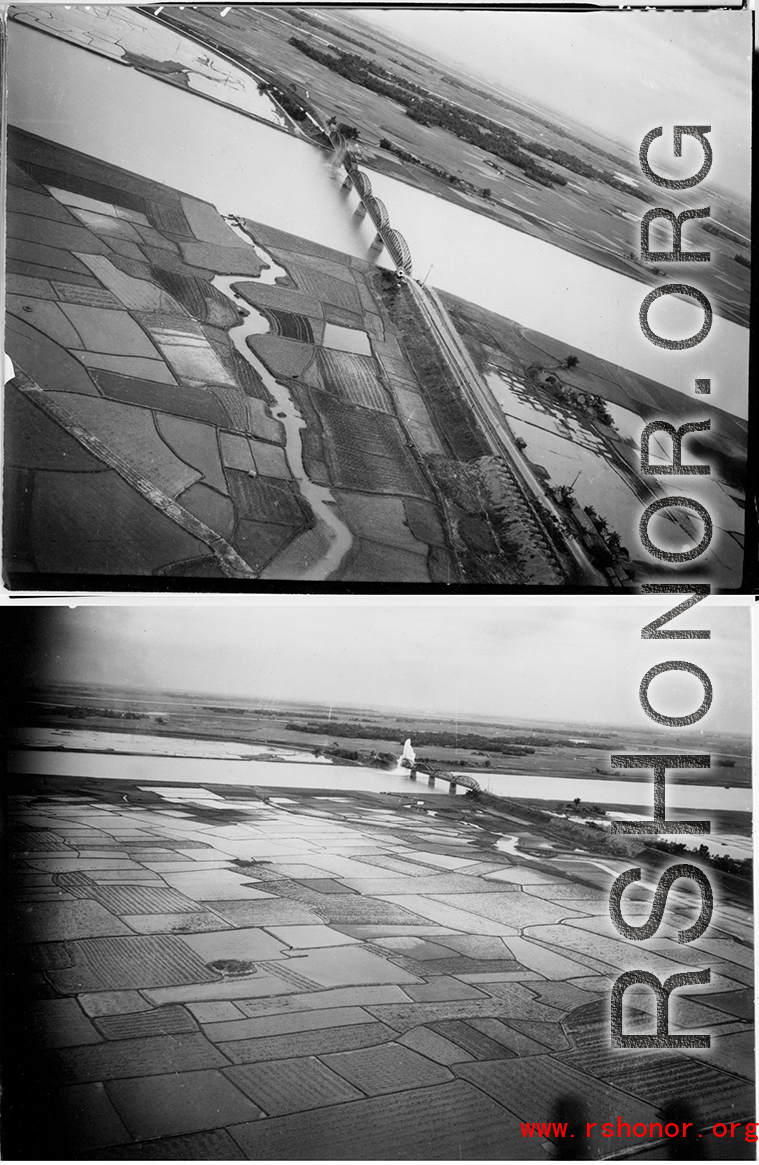 A railway bridge is bombed by American aircraft along a river, probably in SW China, Indochina, or the China-Burma border region.