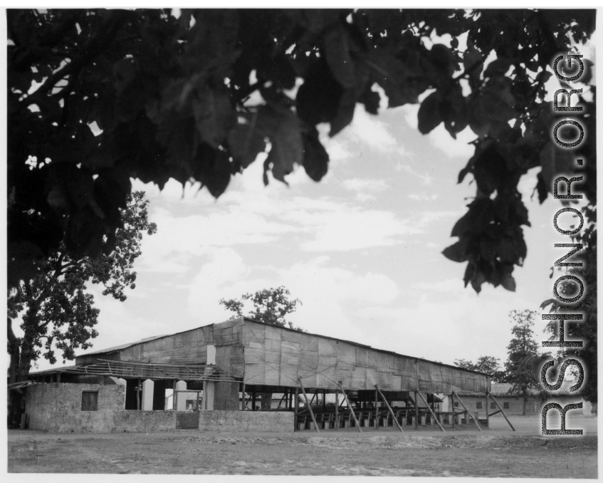 A covered theater area in India.  Scenes in India witnessed by American GIs during WWII. For many Americans of that era, with their limited experience traveling, the everyday sights and sounds overseas were new, intriguing, and photo worthy.