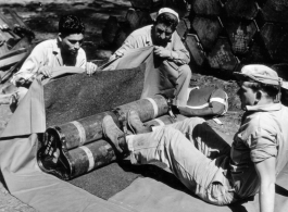 Soldiers packing for an airdrop. 10CU 5G20 5 2ND T.C. AIR SUPPLY SEC.