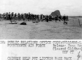 Chinese workers from Liuchow report to work at the former Fourteenth Air Force Base there, which the Japanese evacuated on 30 May. Japanese left the former American airbase heavily mined.