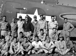 Some American aircraft mechanics and engineers of the 396th Air Service Squadron at Ankang, China, in China during WWII, posing as a group before the partial shell on a C-47 cargo plane that is being used for parts:  First row:  Davis, Clasby, Rush, Anderson, Lt.Chavez, Manuel, Villareal  Second row: Orona, Hoffman, Speer, Clemens, Weidenbener, Hawkins  Third row: Gerdsen, Knecht, Jones, Bowen, Galpen, Szapella, Prock, Mehlenbacher