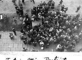 Crowd surrounds American jeep in Futsi Mio District, Nanjing, November 15, 1945.