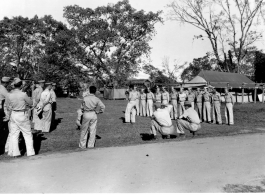 Medal recipients pose for Signal Corps photographers at Myitkina.  Photo form C. W. Leipnitz.