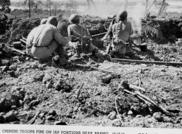 Chinese troops fire on Japanese positions near Bhamo, Burma, on December 13, 1944.  US Army Photo, from Raimon B. Cary.