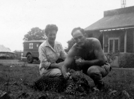 xxxJeanne Porche Morrisey, a flight nurse in India in 1945, posing with a snow leopard and unknown man.  Photo by Mildred Miller Barsby, flight nurse of 803rd MAES at Chabua.