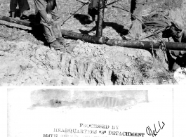 American Army petroleum engineers bend a fuel pipe with a hydraulic jack going through a farming field in SW China while local people look on. During WWII.  Photo by 164th Signal Photographic Company, provided by "Hibbert."