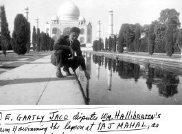 GI E. Gartly Jaco tests the depth of the water at the Taj Mahal in 1945.