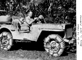 Lt. Col. Charles E. Mason on a muddy jeep, and ready to move forward, in the CBI during WWII.