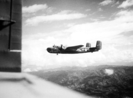 The B-25H "Rum Runner" from the 491st Bomb Squadron, the "RINGERS", flies in formation on a bombing mission during the Japanese "Ichigo" campaign. Sometime after this photo was taken Rum Runner, combat ID '439' was destroyed when they crashed landed near Liuzhou. No crewmen were seriously injured.