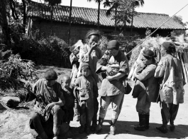 Woman in a village near Yangkai, China, during WWII.  From the collection of Eugene T. Wozniak.