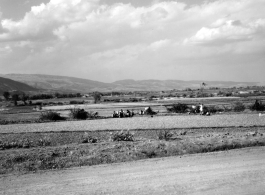 Local women drying laundry on bushes near Yangkai, Yunnan province, China, during WWII.
