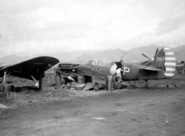 "This is a picture of one of the eight P-40's that was built from our salvage yard at Kwelin (Guilin) China. The planes had new engines installed and were tested and turned over to the fighter groups for combat service.To our knowledge all planes performed to everyone's satisfaction." Caption courtesy of Elmer Bukey.