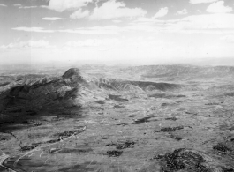 Plain and Yaolingshan (药灵山) mountain in Songming county, Yunnan province, China. During WWII.