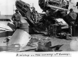 Two American fighter planes, apparently P-51s, collided on a runway at Yunnanyi, China, during WWII, in 1944.