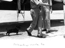 Air Force leadership in China meet to decide to blow up the US air base at Guilin in the face of the Japanese advance during Ichigo in the summer/fall 1944. General Chennault, in pith helmet, is climbing down from the C-47 transport airplane, and an unknown general is reaching out in the middle, with Casey Vincent behind, and Tex Hill, always a all man, reaches to shake hands from the right.