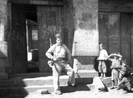 Clayton E. "Fred" Nash at town hall, 10 miles east of Yangkai, Spring 1945.   From the collection of Frank Bates.