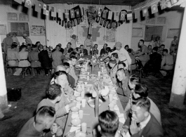 A banquet at the rally. At the end is a row of privileged foreign (American) military officers seated to the right and left, hosted by Zheng Tingji (郑庭笈), commander of the 48th Army Division (陆军第四十八师 ), at the center--showing that this rally is focused on the 48th Army Division.