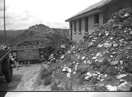 23rd Fighter Control Squadron buildings, surround by bomb barriers, at an American air base in WWII in Yunnan province, China, most likely around the Luliang air base area.