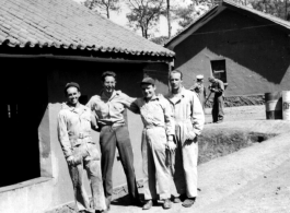 Barracks area in Yangkai, Spring 1945. Hunter Toms, Joe Burns, Bill Gornick, Syd Nyreen.