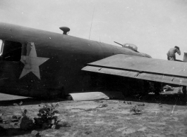 Salvage of a broken B-24 "WE'REWOLVES", crashed on take-off crash on March 20th, at Panagarh. Upon crash, live bombs were spewed out of the bomb bay. Fortunately the arming pins were still in the fuses. Speculation of some was that the accident was caused by loss of lift due to the negative angle of attack caused by a high speed take-off.