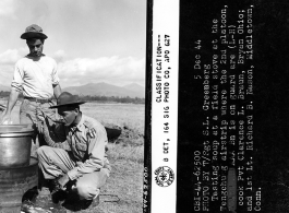 Testing soup at a field stove at the Tengchong airstrip where the 2nd Platoon, 704th AB AAA Battalion, is on guard are cook, Pvt. Clarence L. Braun, and 1st Lt. Richard B. Nason.  December 5, 1944.  Photo by T/Sgt. S. L. Greenberg. 164th Signal Photographic Company.  Passed by Emanuel Goldberg.