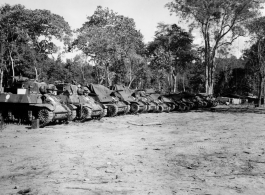 Tanks parked along Burma Road.  797th Engineer Forestry Company in Burma.  During WWII.