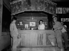 GIs drink at club in burma.  During WWII.  797th Engineer Forestry Company.